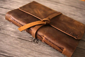 LEATHER GUEST BOOK - T. Anthony